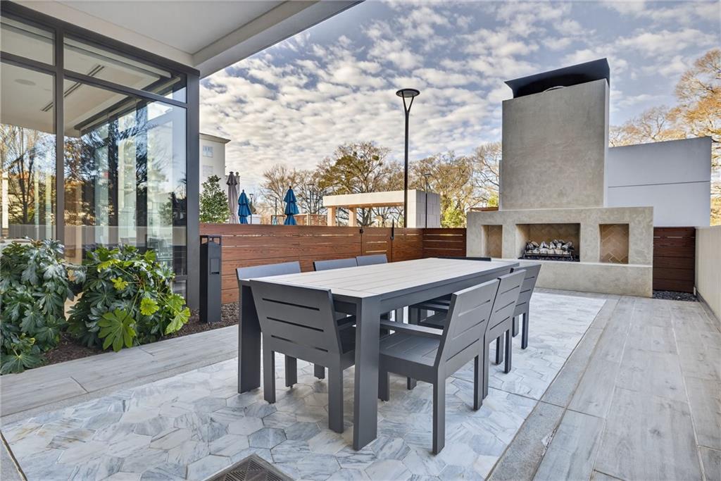2520 Peachtree Road Northwest, Unit 1003 Atlanta, GA 30305 - Photo 48 of 63 a view of an outside dining space with furniture