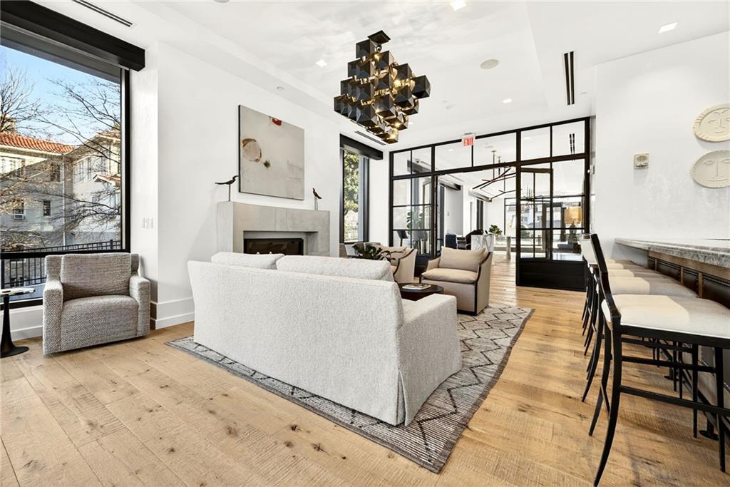 2520 Peachtree Road Northwest, Unit 1003 Atlanta, GA 30305 - Photo 52 of 63 a living room with furniture and a large window