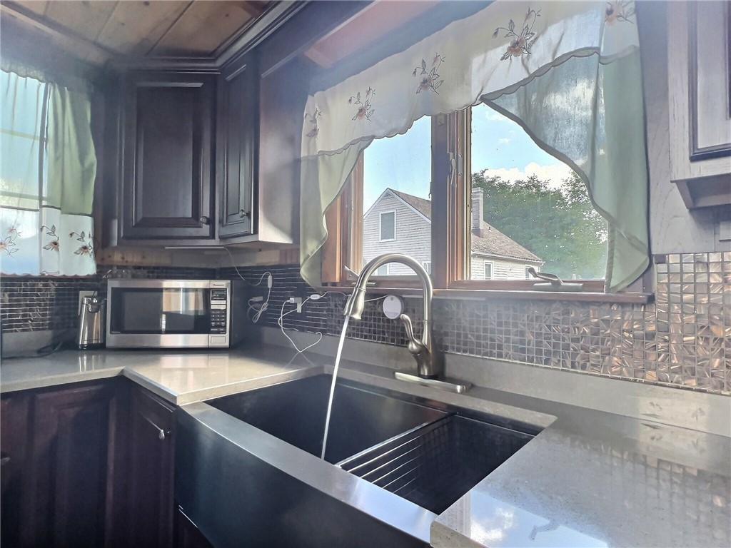 5278 Old Telephone Road Bethany, NY 14054 - Photo 11 of 36 Deep stainless farm sink, new back splash and quar