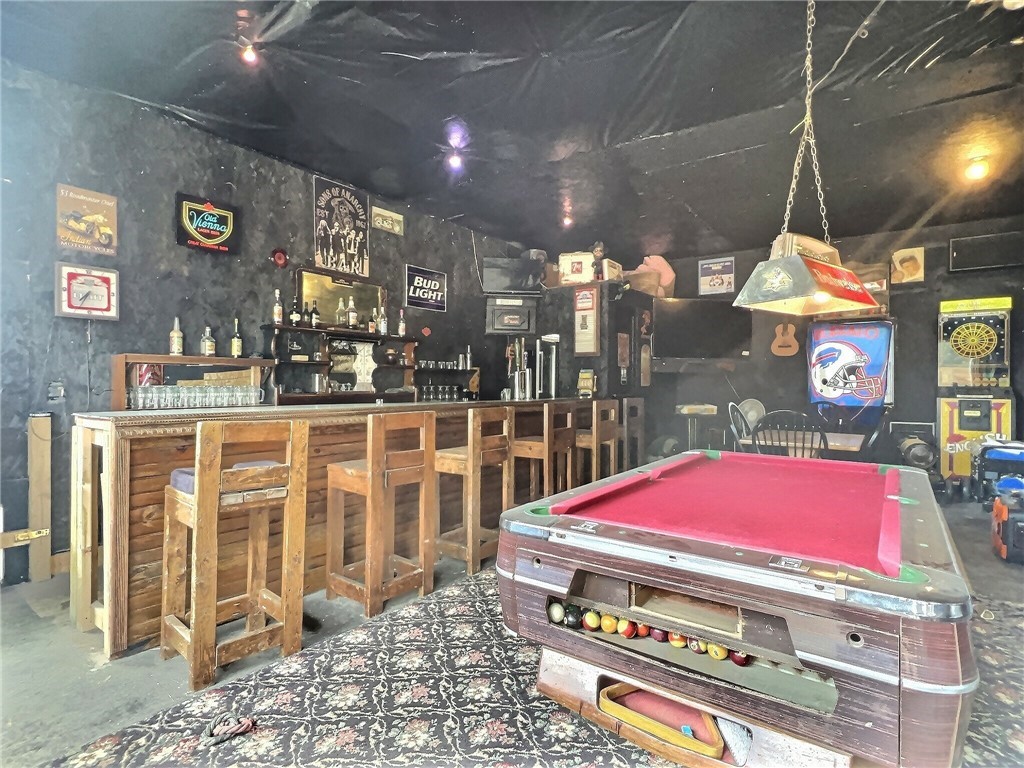 5278 Old Telephone Road Bethany, NY 14054 - Photo 29 of 36 550 sq.ft. game room with sliding glass doors to t