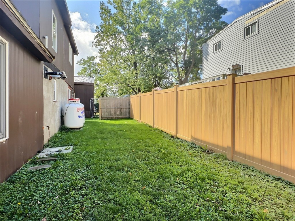 5278 Old Telephone Road Bethany, NY 14054 - Photo 34 of 36 Fenced in side yard with solar lighting