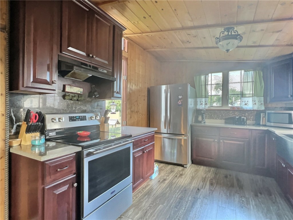 5278 Old Telephone Road Bethany, NY 14054 - Photo 9 of 36 Hickory cabinets with Cherry finish