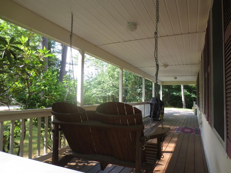 9 Quail Run Road Sanford, ME 04073 - Photo 2 of 25 Farmer's Porch with Porch Swing