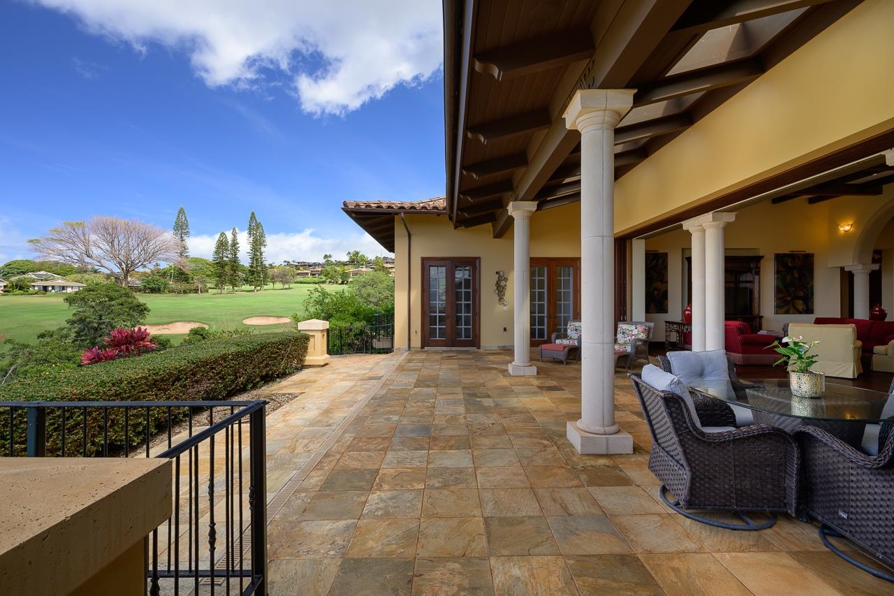104 Anapuni Loop Lahaina, HI 96761 - Photo 14 of 45 a view of a porch with furniture and a garden