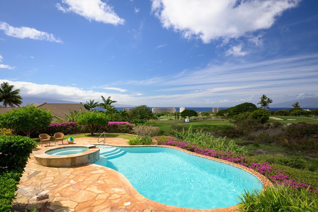 104 Anapuni Loop Lahaina, HI 96761 - Photo 17 of 45 a swimming pool with outdoor seating and yard