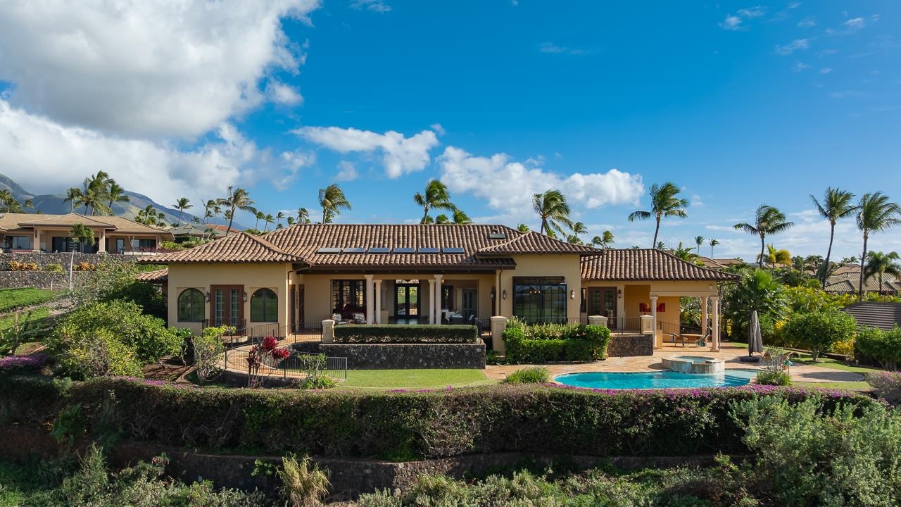 104 Anapuni Loop Lahaina, HI 96761 - Photo 20 of 45 a front view of a house with garden