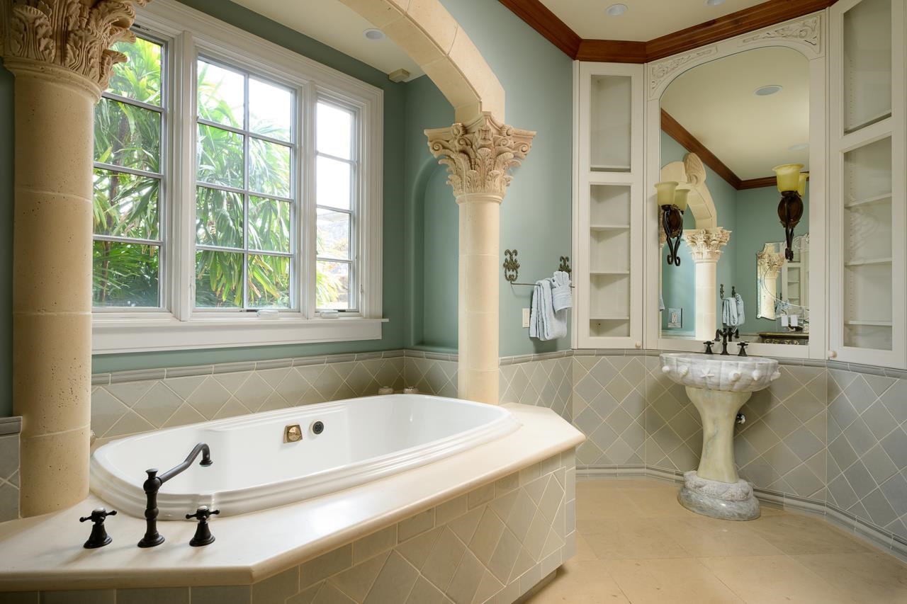 104 Anapuni Loop Lahaina, HI 96761 - Photo 35 of 45 a bath tub sitting in a bathroom next to a window