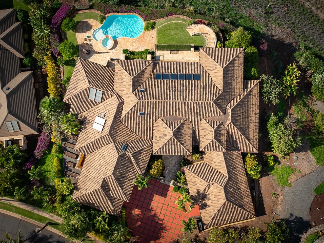 104 Anapuni Loop Lahaina, HI 96761 - Photo 38 of 45 an aerial view of a house with a swimming pool