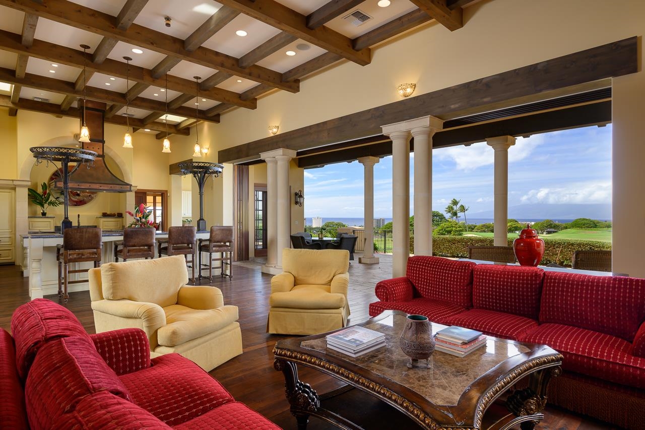 104 Anapuni Loop Lahaina, HI 96761 - Photo 5 of 45 a living room with furniture and a large window