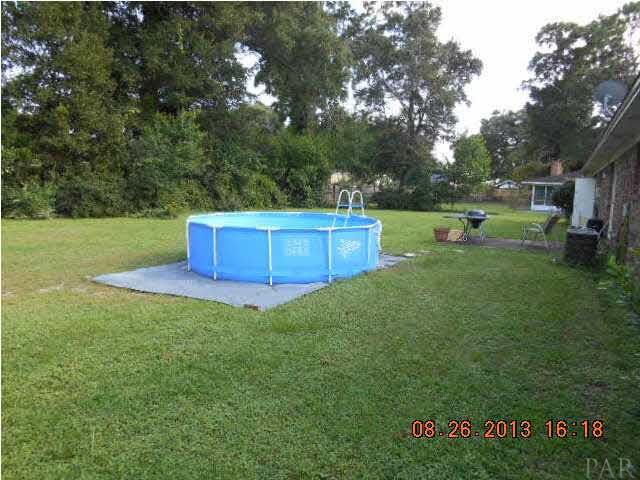 8408 Ridgefield Road Pensacola, FL 32514 - Photo 18 of 20 Large Fenced Back Yard. Pool will be removed.