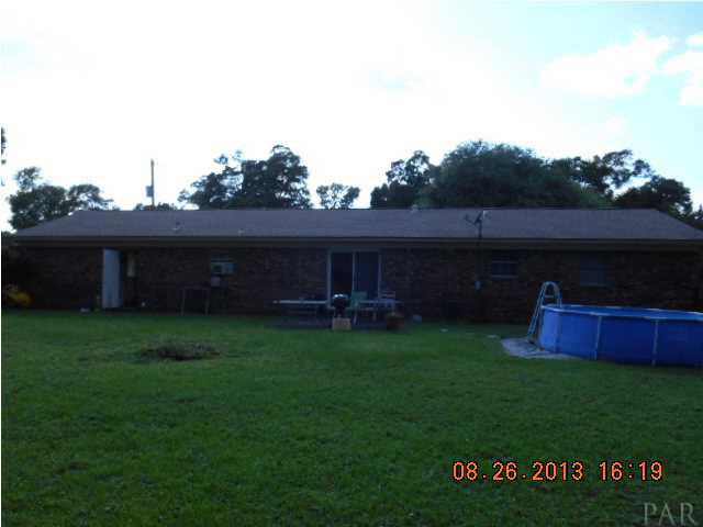 8408 Ridgefield Road Pensacola, FL 32514 - Photo 20 of 20 Rear of home features large fenced backyard