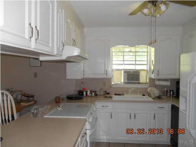 Kitchen has lots of cabinet space