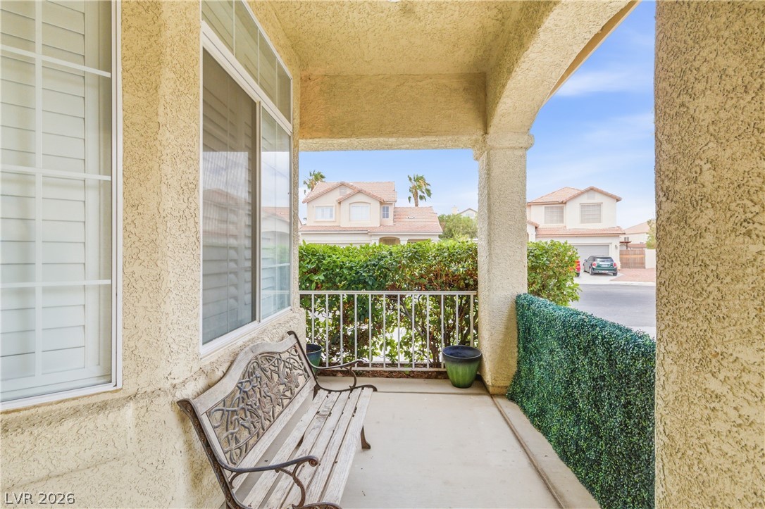 9523 Observer Street Las Vegas, NV 89123 - Photo 6 of 42 Welcome guests to this charming front porch, offering a pleasant neighborhood outlook.
