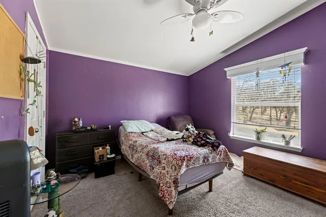 a bathroom with a sink a mirror and a shower