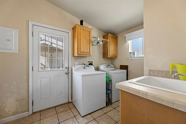 a room with furniture and a chandelier