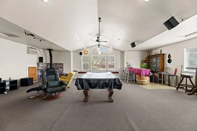 a view of a balcony with wooden floor