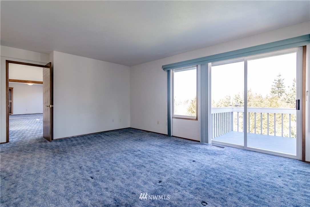 449 Guy Kelly Road Port Angeles, WA 98362 - Photo 20 of 40 a view of an empty room with a window