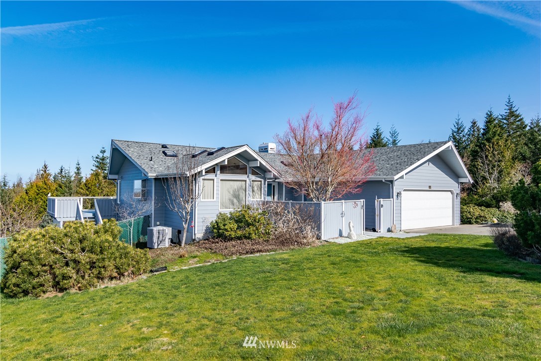 449 Guy Kelly Road Port Angeles, WA 98362 - Photo 3 of 40 a front view of a house with a yard