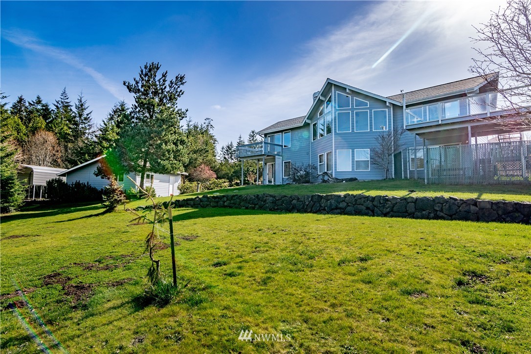 449 Guy Kelly Road Port Angeles, WA 98362 - Photo 4 of 40 a view of a house with a yard