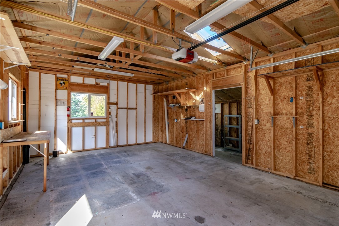 449 Guy Kelly Road Port Angeles, WA 98362 - Photo 31 of 40 a view of a room with wooden walls