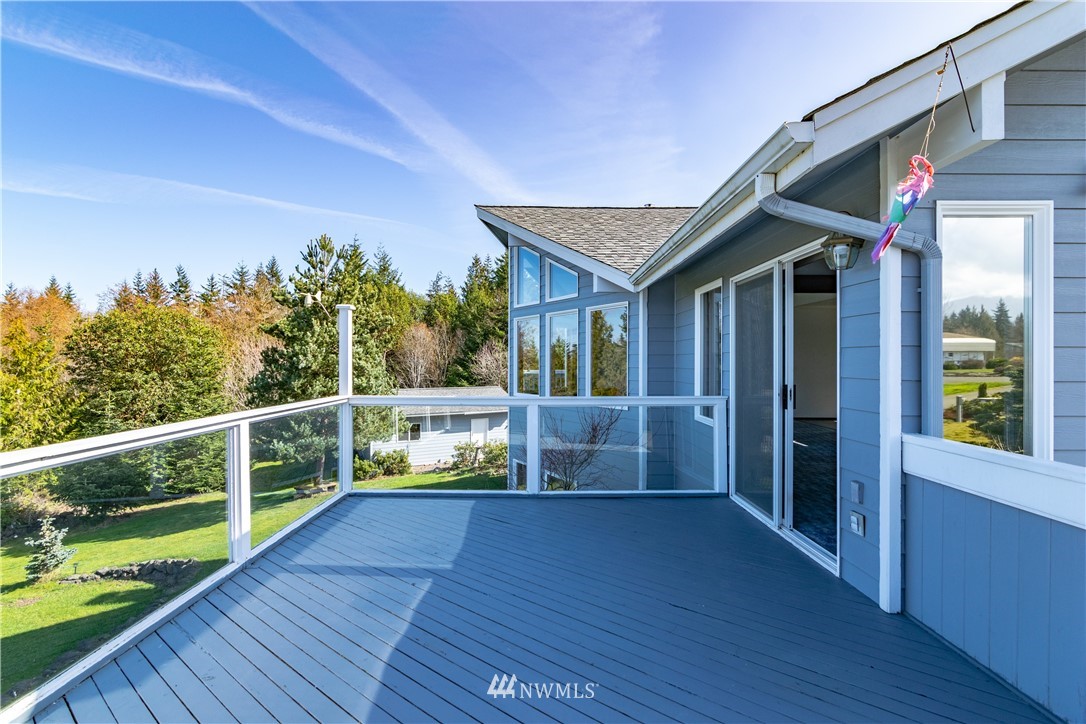449 Guy Kelly Road Port Angeles, WA 98362 - Photo 34 of 40 a view of house with deck and outdoor seating