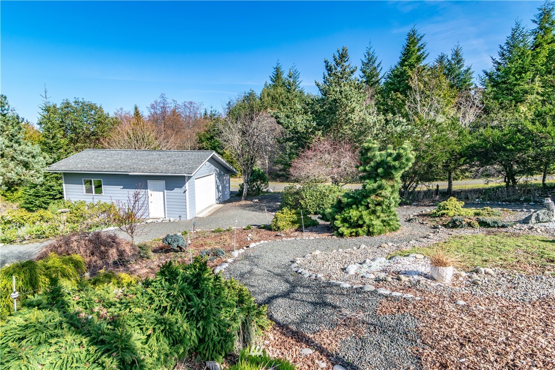 449 Guy Kelly Road Port Angeles, WA 98362 - Photo 36 of 40 a view of a house with a yard
