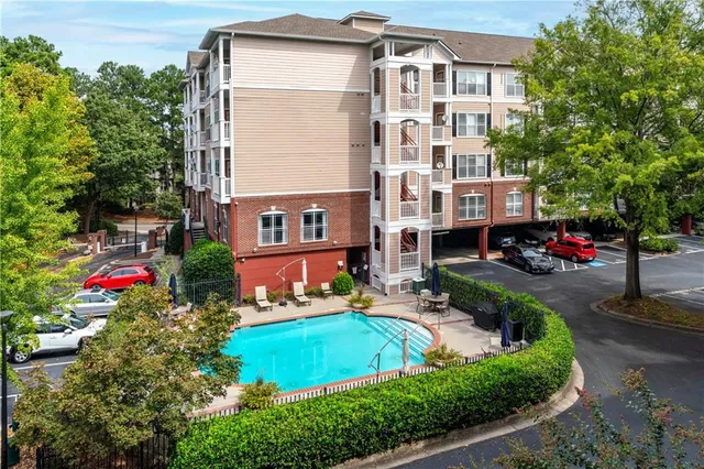 a front view of a building with lot of windows