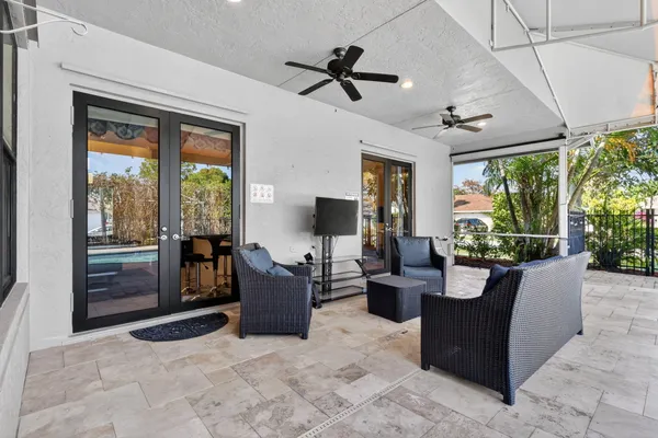 a view of swimming pool with a patio
