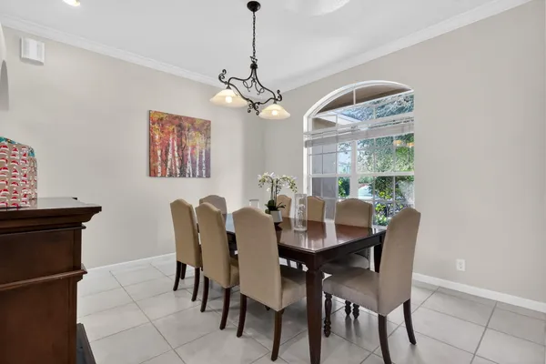a view of a dining room with furniture