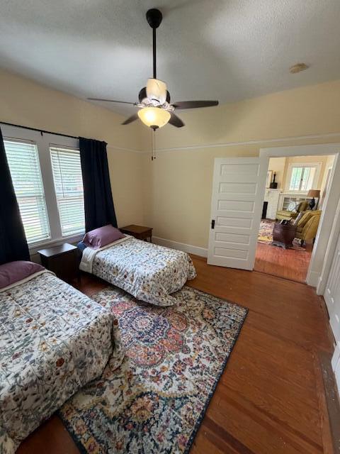 82 Nightingale Street Barnwell, SC 29812 - Photo 9 of 13 a bedroom with a large bed and a chandelier