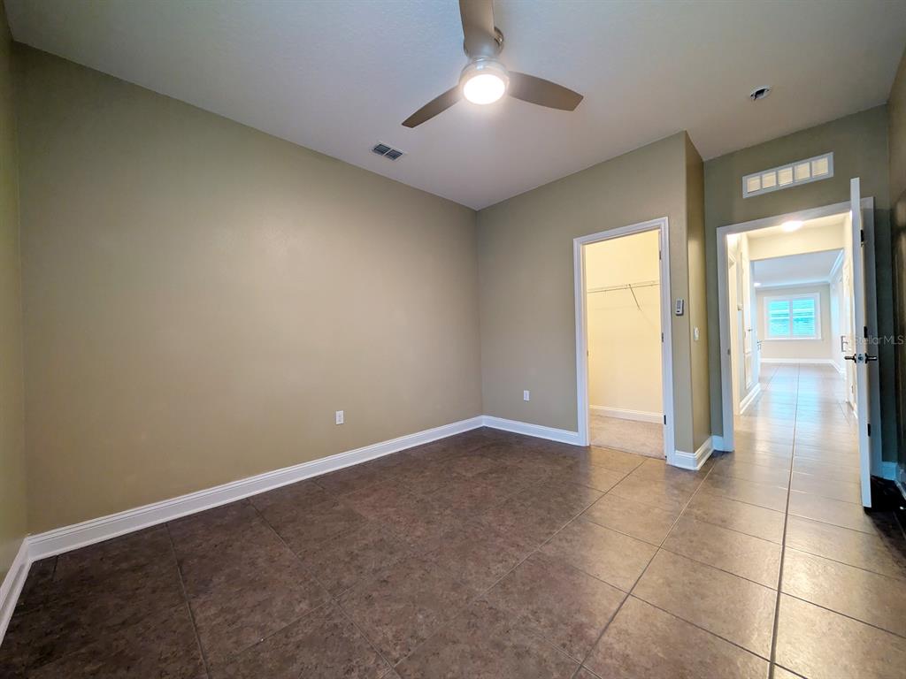 43 Turtle Ridge Drive Flagler Beach, FL 32136 - Photo 50 of 61 Bedroom 2 with walk-in closet view