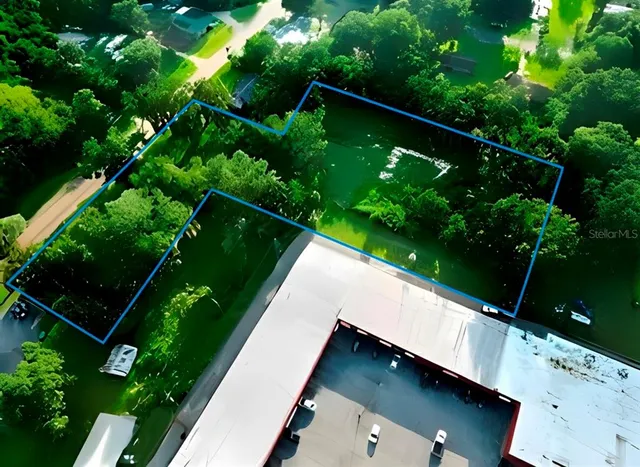 a view of a yard from a balcony