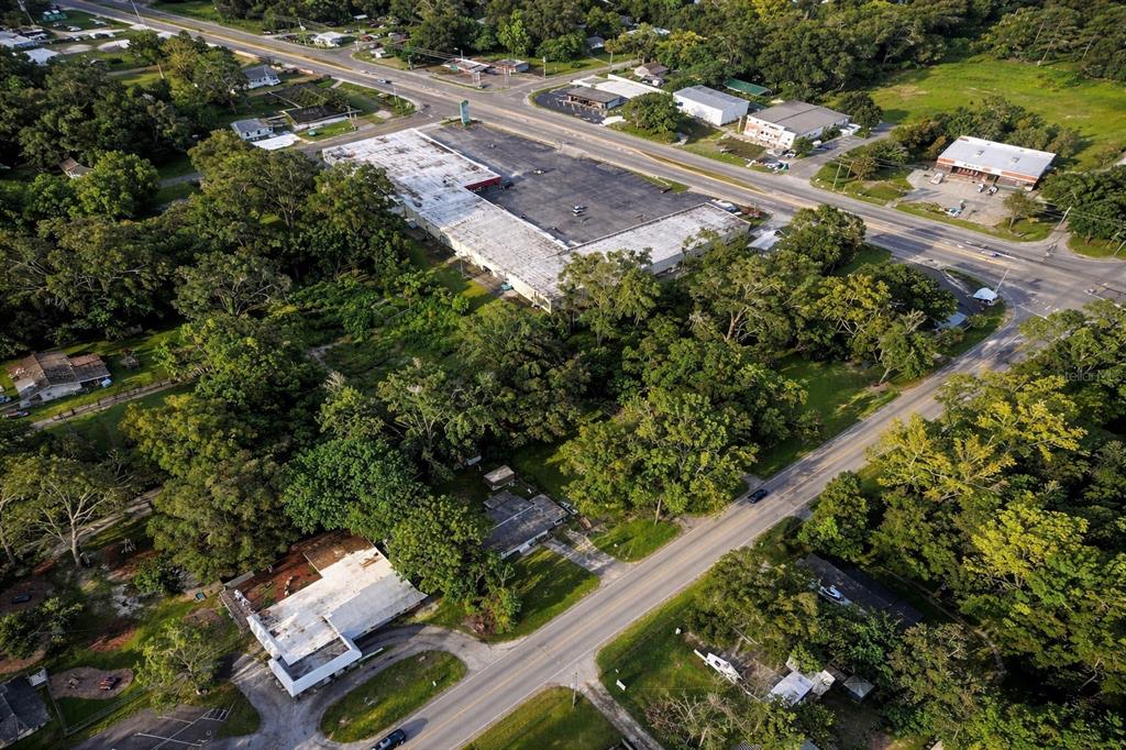 940 Northeast 35th Street Ocala, FL 34479 - Photo 5 of 7 an aerial view of swimming pool yard and outdoor seating