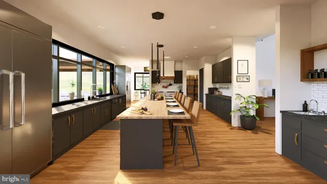 a kitchen with stainless steel appliances kitchen island granite countertop a refrigerator a stove top oven a sink dishwasher and wooden cabinets