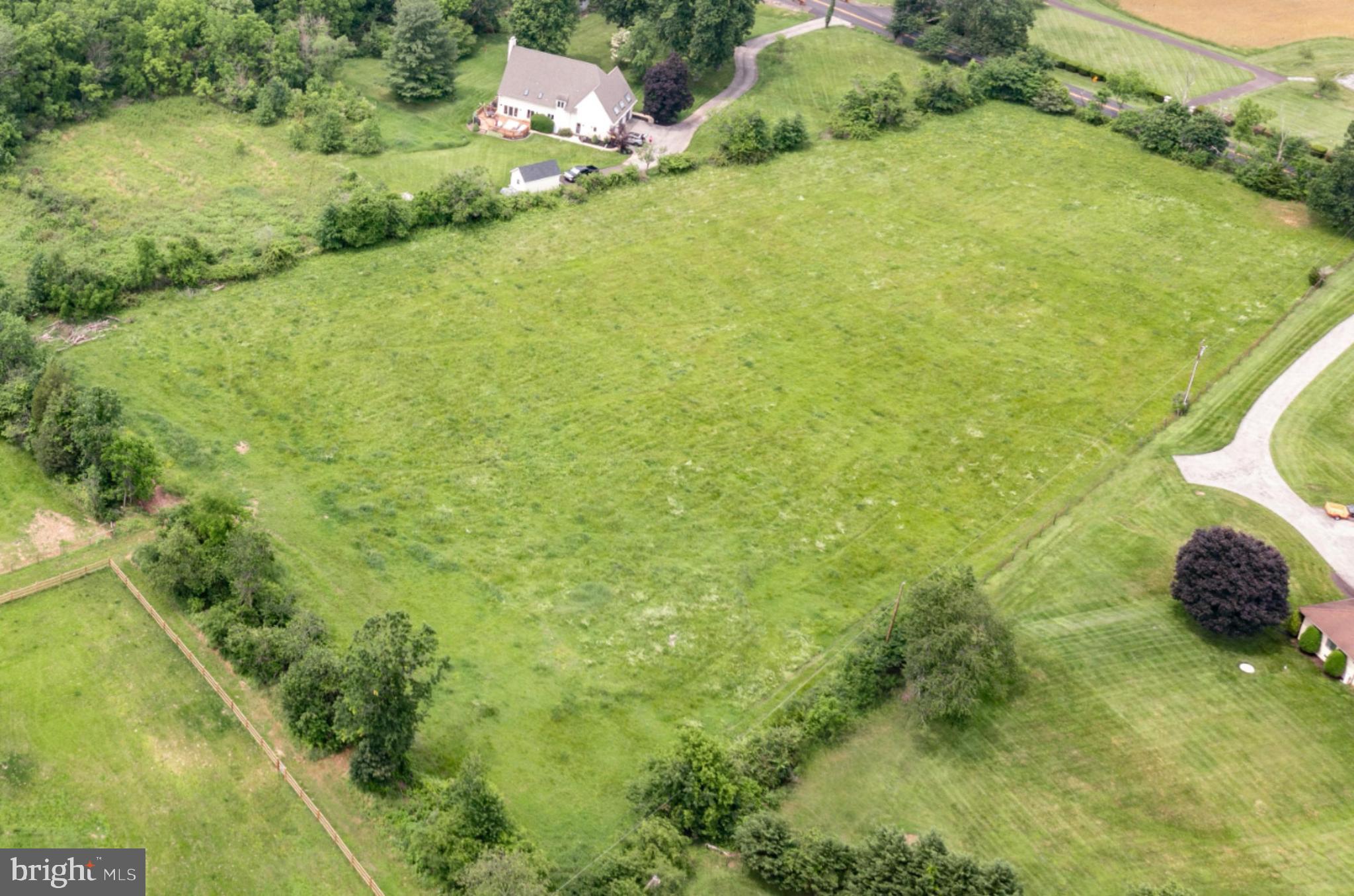 Building Package Building Package Callowhill Road Perkasie, PA 18944 - Photo 5 of 12 a view of a big yard with potted plants