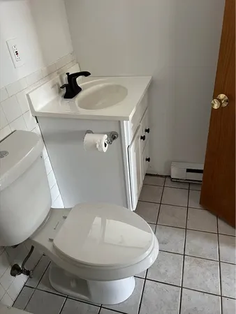 a bathroom with a sink and mirror