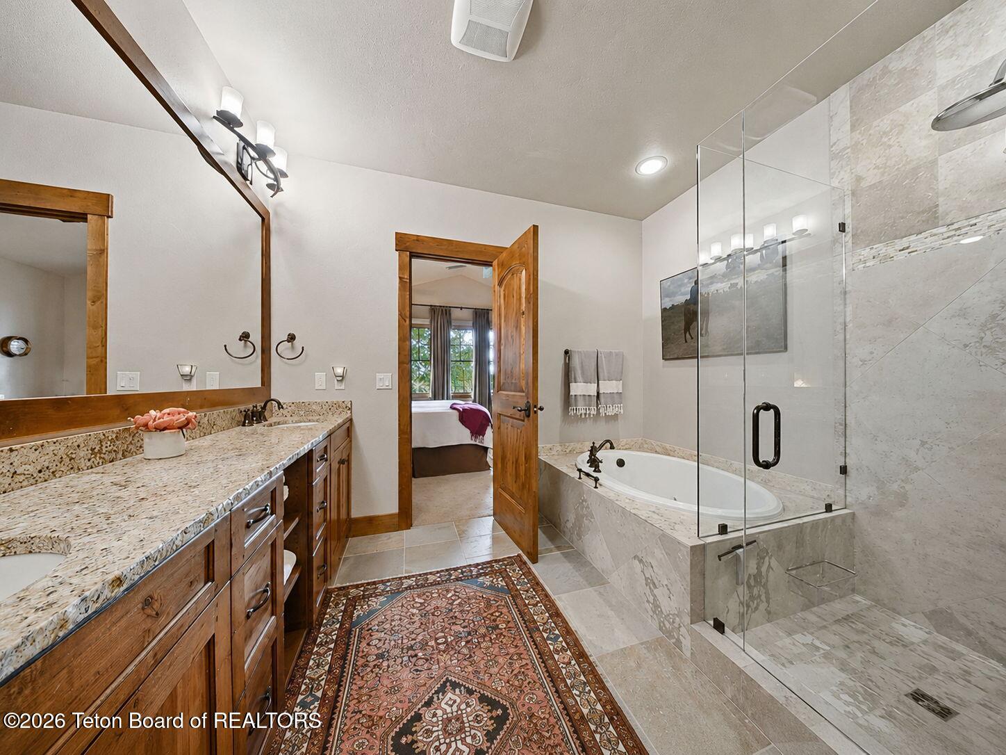 92 Bison Drive Victor, ID 83455 - Photo 17 of 52 13 primary suite shows shower detail
