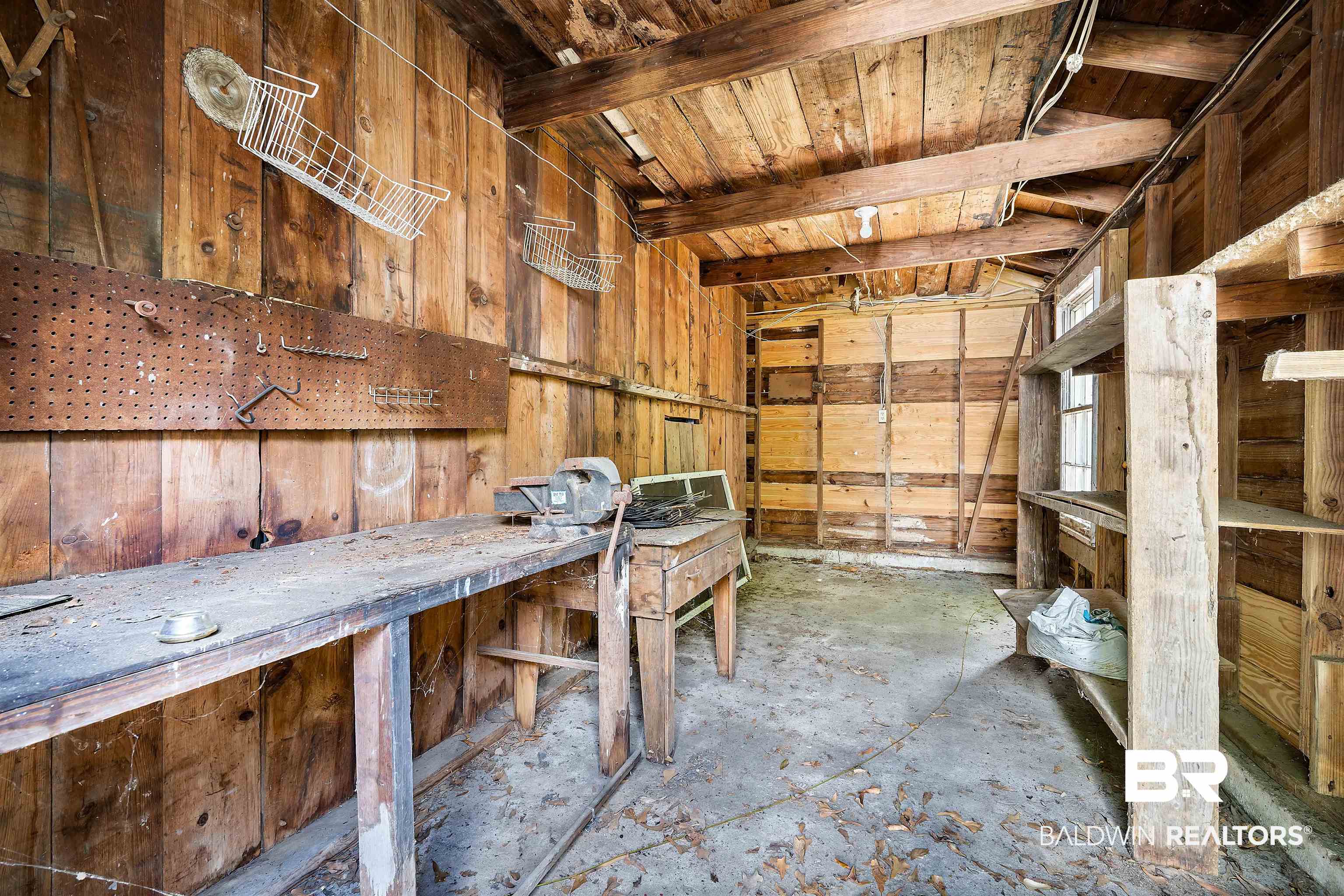 103 Emogene Place Mobile, AL 36606 - Photo 31 of 32 Misc room featuring wooden walls
