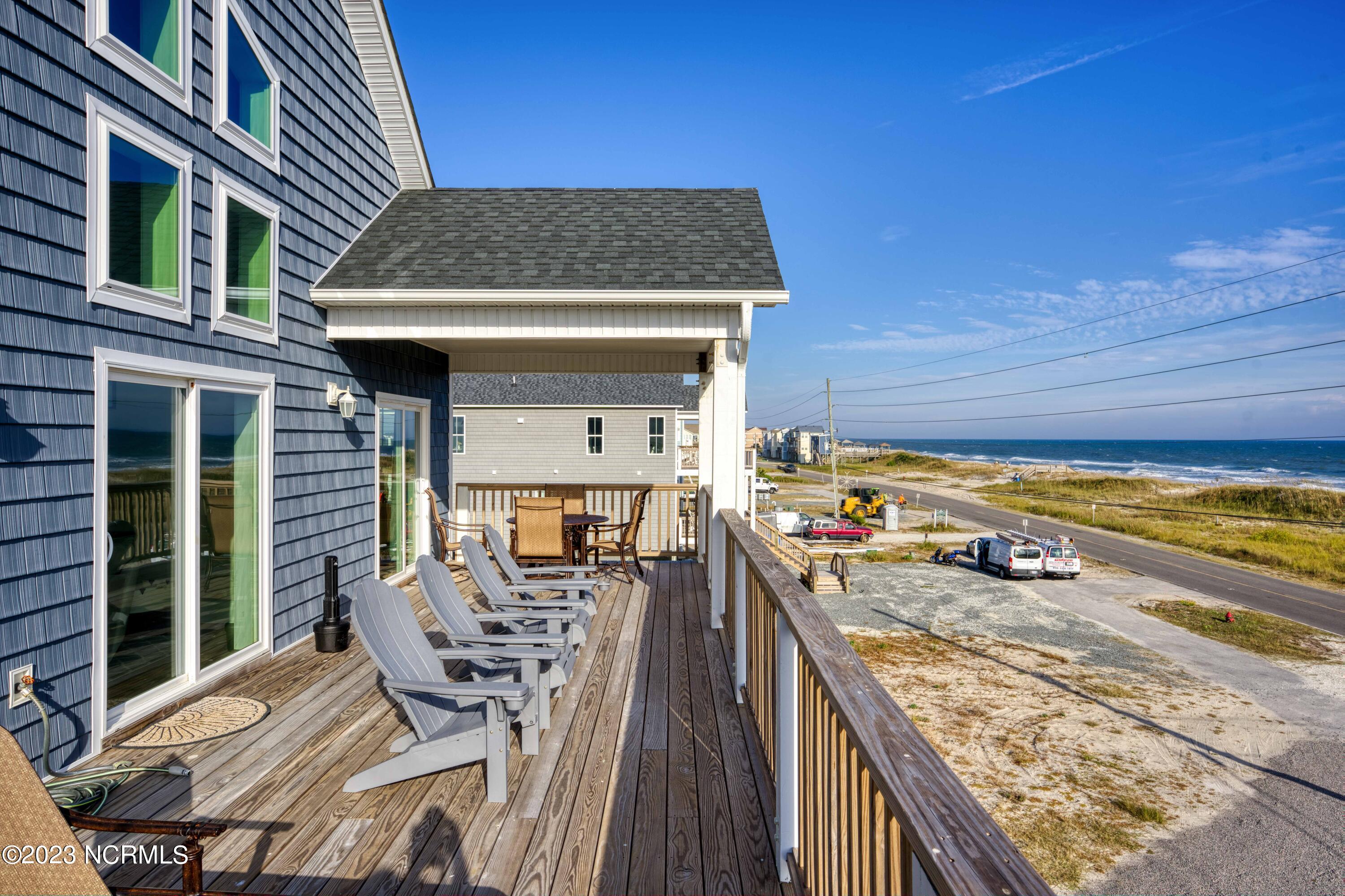1231 New River Inlet Road North Topsail Beach, NC 28460 - Photo 38 of 100 Deck of Main Living & Dining