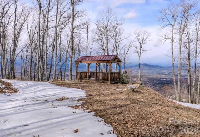 a view of a bench in a backyard
