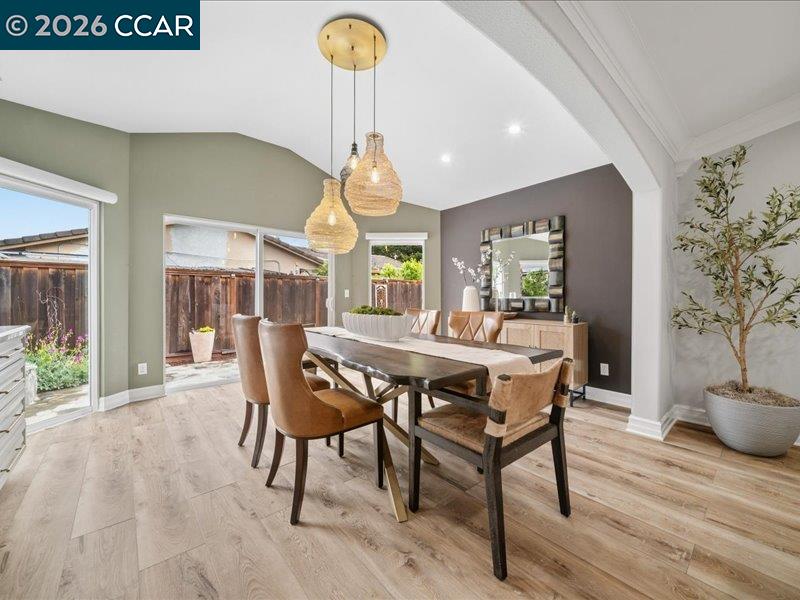 400 Fernando Court San Ramon, CA 94583 - Photo 13 of 38 a dining room with furniture a chandelier and wooden floor