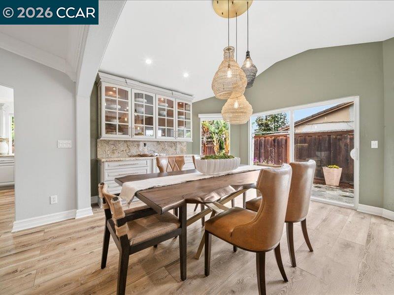 400 Fernando Court San Ramon, CA 94583 - Photo 14 of 38 a dining room with furniture a chandelier and wooden floor