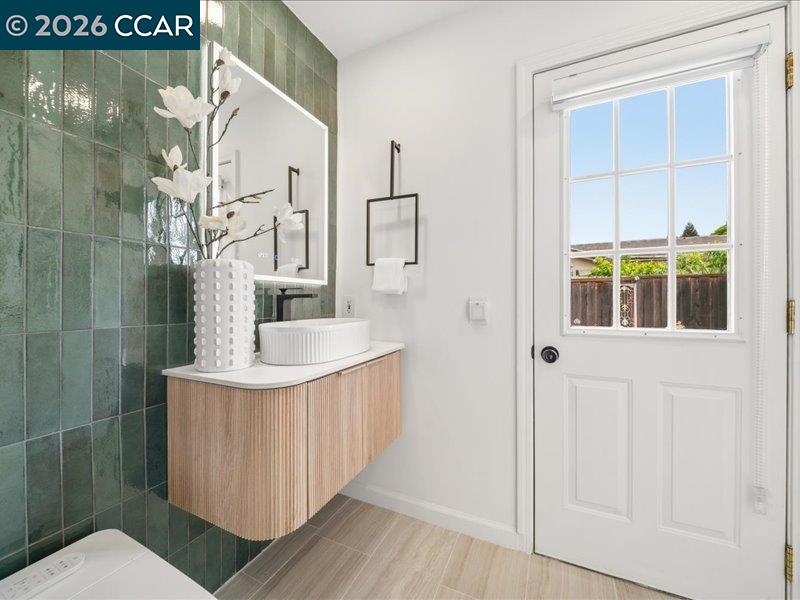 400 Fernando Court San Ramon, CA 94583 - Photo 24 of 38 a bathroom with a sink a toilet and shower