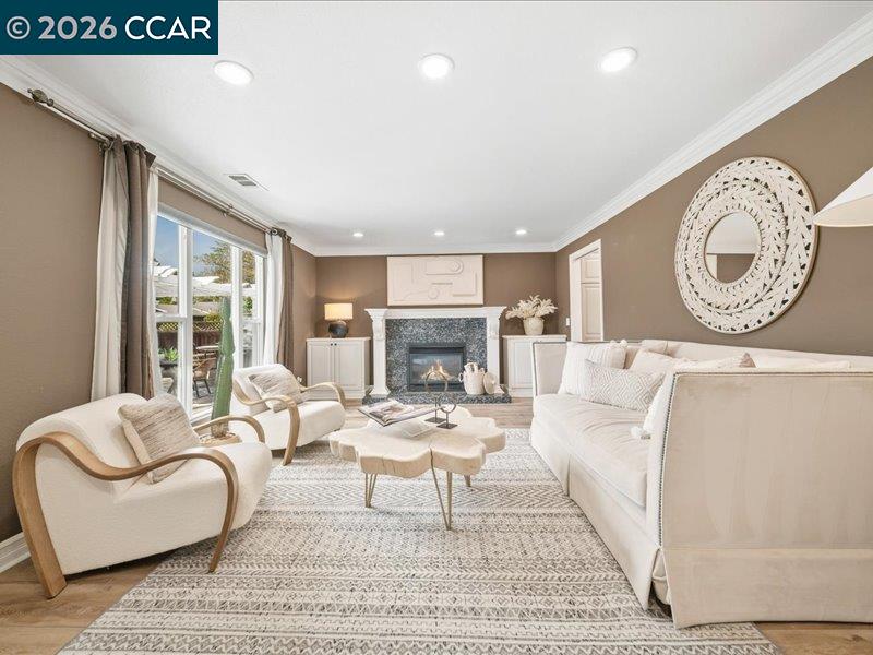 400 Fernando Court San Ramon, CA 94583 - Photo 3 of 38 a living room with furniture a large window and a fireplace