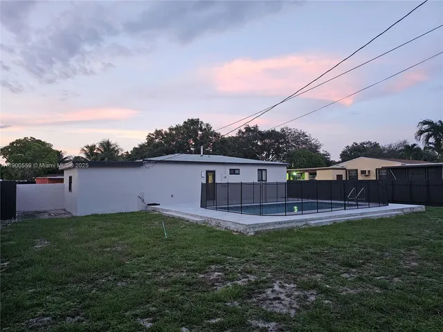 a view of a backyard with a garden