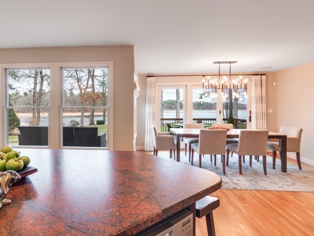 128 Locksley Road Lynnfield, MA 01940 - Photo 13 of 38 a view of a dining room with furniture and wooden floor