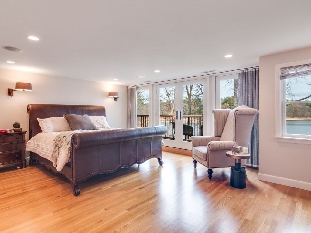 128 Locksley Road Lynnfield, MA 01940 - Photo 19 of 38 a bedroom with a bed and wooden floor