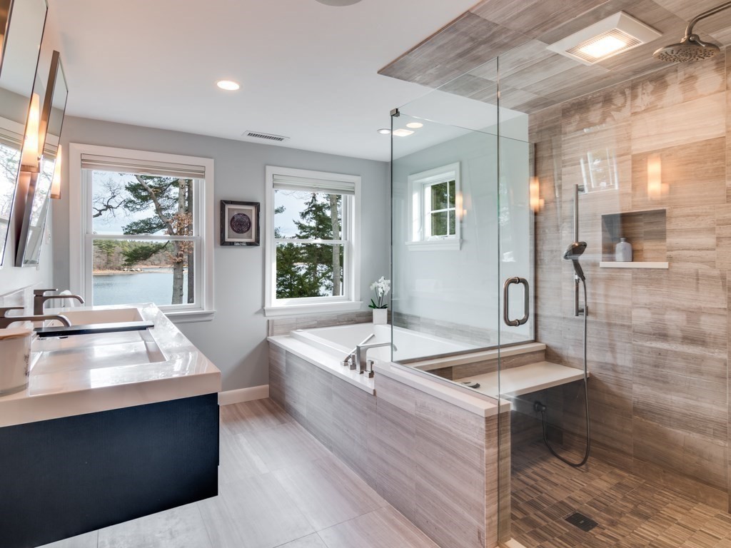 128 Locksley Road Lynnfield, MA 01940 - Photo 20 of 38 a living room with stainless steel appliances kitchen island granite countertop furniture and a large window