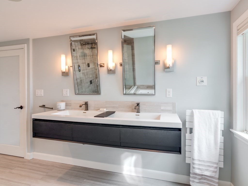 128 Locksley Road Lynnfield, MA 01940 - Photo 21 of 38 a en suite bathroom with double sink and mirror