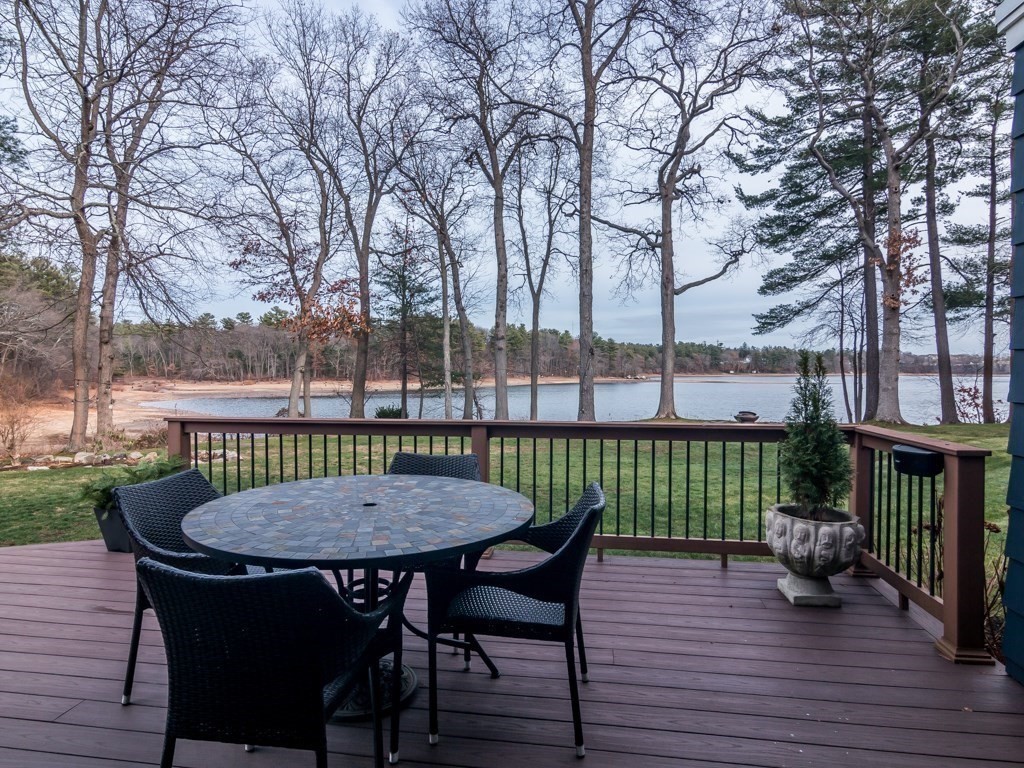 128 Locksley Road Lynnfield, MA 01940 - Photo 27 of 38 a view of a chairs and table on the wooden floor